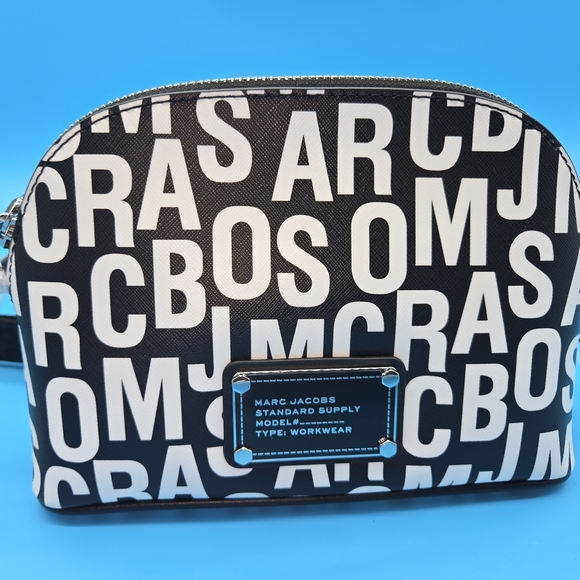 Marc Jacobs Handbags - Marc Jacobs Black and White Crossbody Bag With Thin Logo Strap